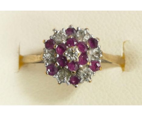 A 9ct gold, ruby and diamond cluster ring, M, 1.5gm 