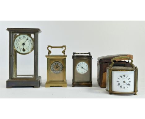 Four manual wind brass carriage clocks to include a Whiteleys of London, made in France, enamel dial, Roman numerals, oval sh