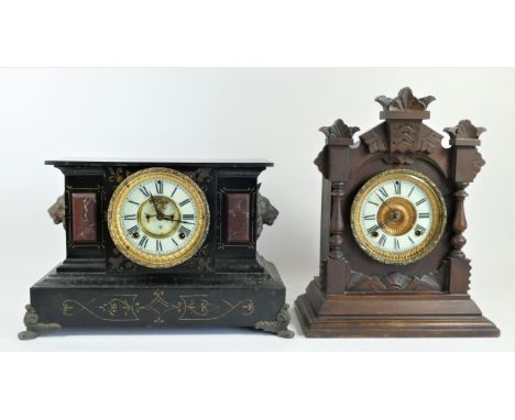 An Ansonia Clock Company New York 8 day chiming mantle clock, oak cased with carved decoration, painted gilt decoration, enam