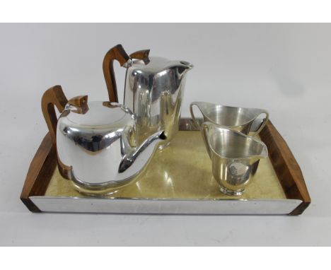 A 1950's five piece Picquot/Newmaid ware tea service, comprising of teapot, coffee pot, milk jug, sugar bowl and tray. 