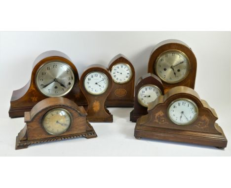 Seven mantle clocks to include a W.A.Perry &amp; Co Birmingham, balloon shaped mantle clock with fruit wood inlay and shell d
