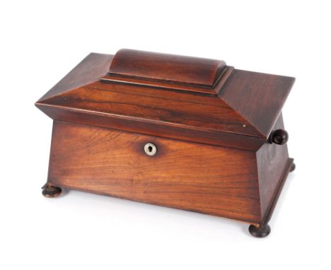 A 19th Century rosewood sarcophagus shaped tea caddy raised on bun feet, 35cm long AF