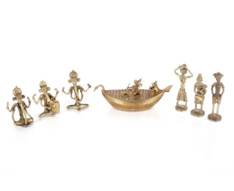 A collection of various Indian bronzed figures including Ganesh playing musical instruments; another group of a boat with Gan