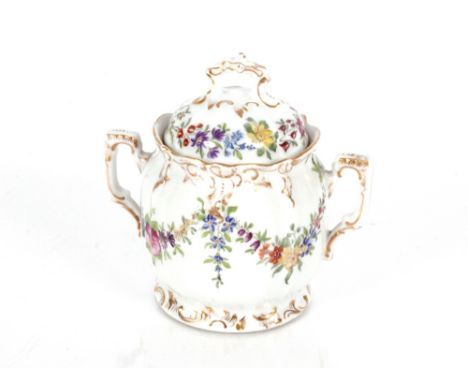 A 19th Century French porcelain sucrier and cover, having floral decoration heightened in gilt, 14cm high&nbsp;