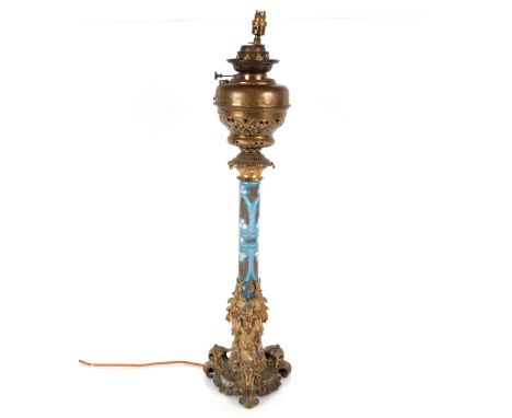 &nbsp;Victorian blue opaque glass and brass mounted oil lamp of large proportions with Rococo style base later converted to e