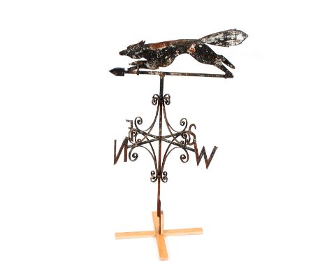 A rare late 18th Century iron fox weather vane, 82cm wide x 136cm high, including later base