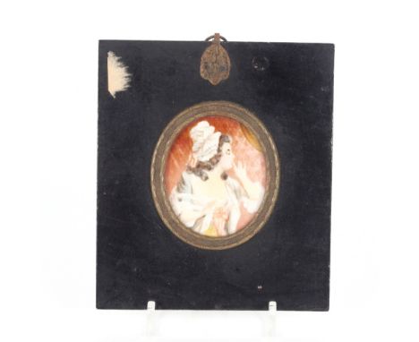 19th Century school, portrait miniature of a lady wearing lace cap in ebonised and brass mounted frame&nbsp;