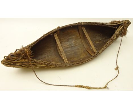 Iroquois model canoe, cedar and birch bark with fibre binding, L60cm  Condition Report Click here for further images, conditi