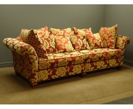 Grande four seat sofa upholstered in red and gold floral fabric, with scatter cushions, W255cm, D96cm - 18 months old Conditi