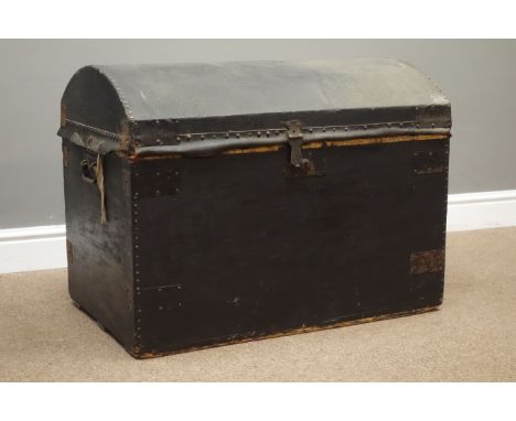 Early 20th century dome top travelling trunk, black painted canvas and metal bound, with wrought metal handles, W77cm, H58cm,