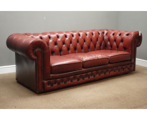 Three seat Chesterfield sofa upholstered in oxblood red buttoned leather (W204cm), and another three seat Chesterfield sofa (