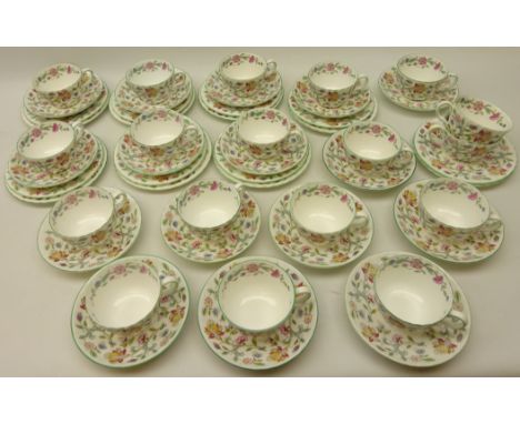 Set of seven Minton 'Haddon Hall' trios with tea plates, nine cups & saucers, two cups and two tea plate (50) Condition Repor