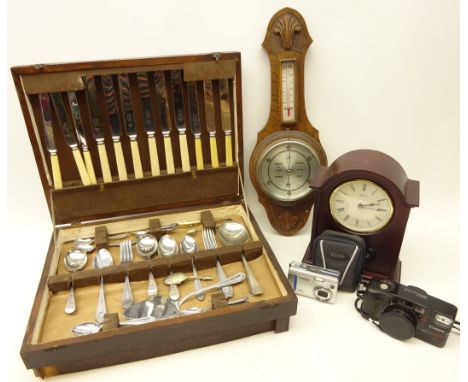 20th century oak aneroid barometer and thermometer H49cm, Hermle mantel clock, an oak part canteen of matched plated cutlery 