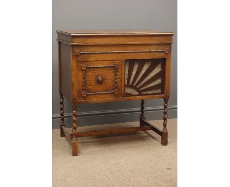 Early 20th century Barrynolala '482721'Oak gramophone cabinet, two doors with one sun burst speaker cover, barley twist suppo