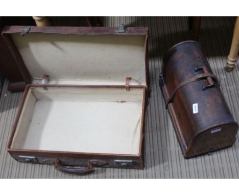 A TAN SUITCASE together with a wooden cased MANUAL SEWING MACHINE 