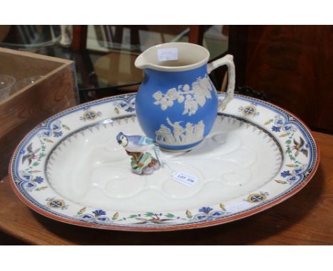 A LARGE 19TH CENTURY OVAL SERVING PLATTER, together with a Copeland Spode wine jug, and a Royal Worcester model of a blue jay