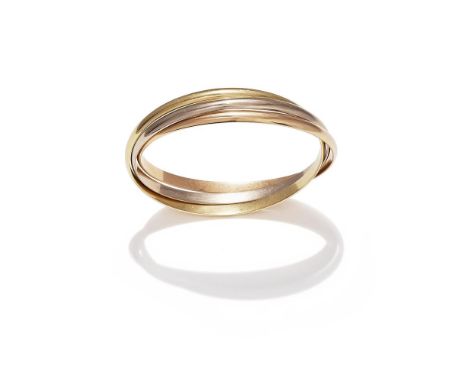 CARTIER, A 'TRINITY' BANGLE Composed of three interlocking tri coloured bangles, signed Cartier, numbered LR541, maker's mark