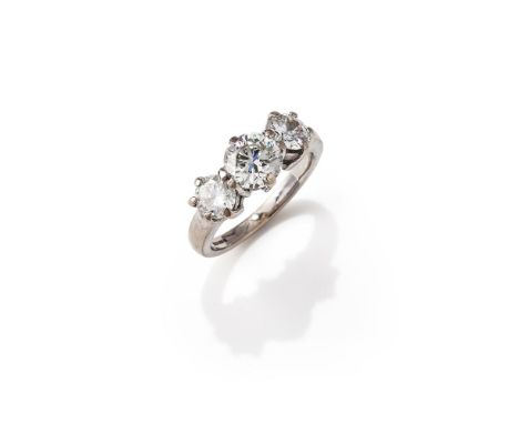 A DIAMOND THREE STONE RING Set with three graduated brilliant cut diamonds, centre weighing 1.79 carats, mounted in 18ct whit