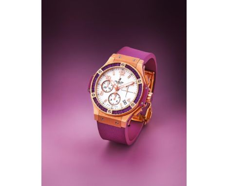 HUBLOT, BIG BANG TUTTI FRUTTI A GOLD COLOURED, TITANIUM AND AMETHYST CHRONOGRAPH WRISTWATCH WITH DATE, NO. 813837, CIRCA 2010