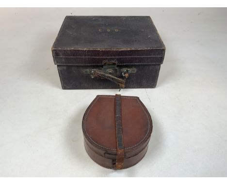 A Mappin & Webb leather vanity box with silver topped bottles and leather boxes together with a leather collar box and conten