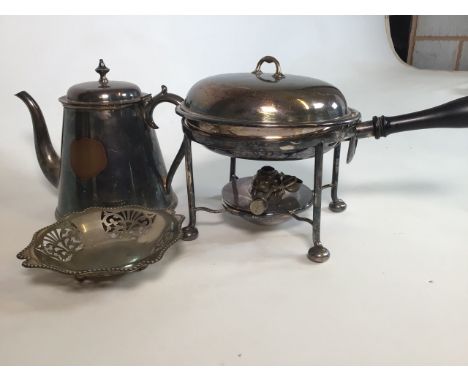 A Silver plated pan on burner stand, kettle and a plated bowl. 