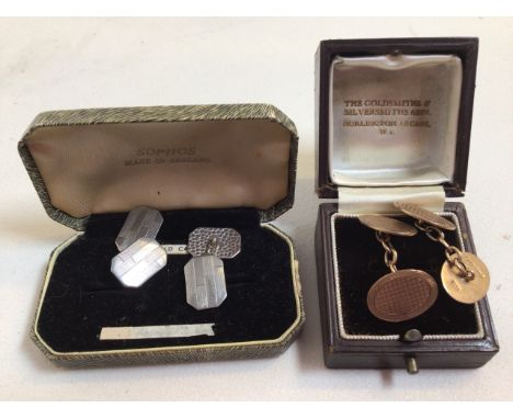 A pair of 9ct gold cufflinks 7.8 grams also with sa pair of silver coloured cufflinks. 