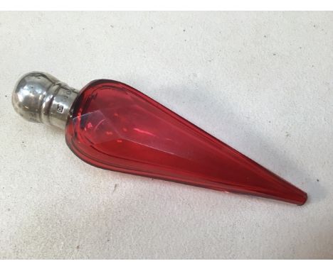 A teardrop silver lidded cranberry glass perfume bottle.H:11cm 
