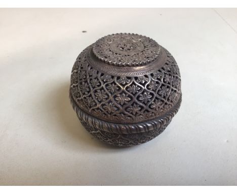 An Indian silver betel nut holder W:8.5cm x H:7.5cm slight dent to one side 