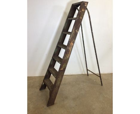 A pair of metal step ladders.H:157cm