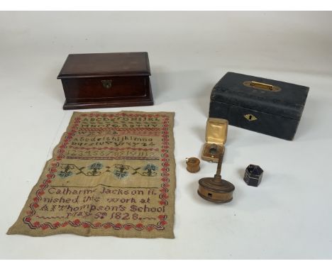 Sewing interest. A sampler dated 1828 together with a wooden spindle, tape measure, silver thimble, two jewellery boxes and a