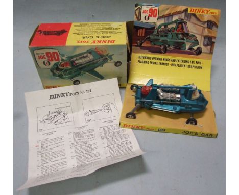 Dinky Toys, 102, Joe 90, Joe's Car, metallic green/blue, with original box, display stand and facsimile leaflet.