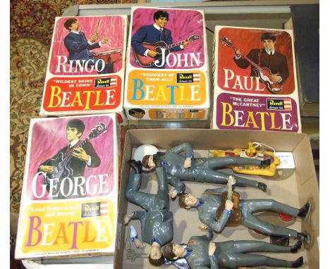 Four Revell Beatles Figures plastic figures, assembled, (a/f, breakages), with original boxes and a Corgi Yellow Submarine mo