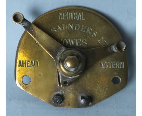 A brass engine order telegraph with "Ahead", "Neutral" and "Astern"  by E Saunders Ltd, Cowes, 12.5cm.