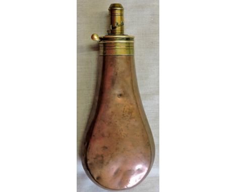 Copper and Brass Powder Flask, made by SYKES. In untouched condition with its spring still functional.