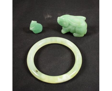 Stone - a polished jade apple green bangle; a carved rabbit and mouse (3)