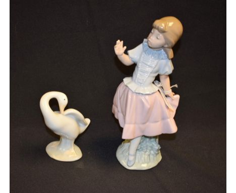 A Nao figurine, a young girl, printed impressed marks, B26F; a Lladro goose (2)