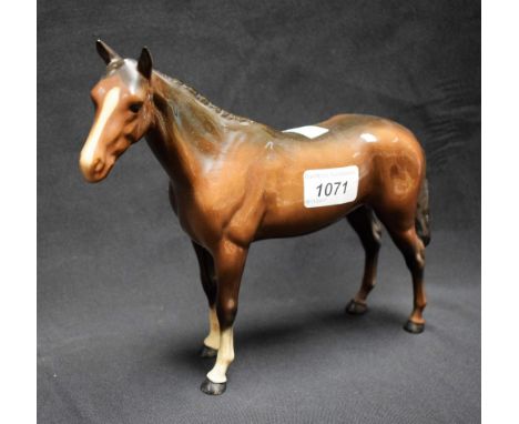 A Beswick ceramic model of a large brown horse