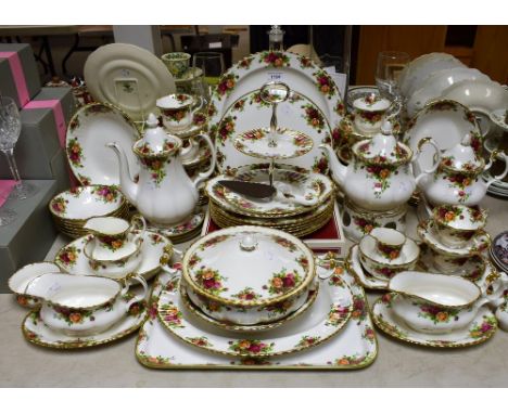 A Royal Albert Old Country Roses pattern dinner and tea service for six comprising dinner plates, side plates, bowls, vegetab