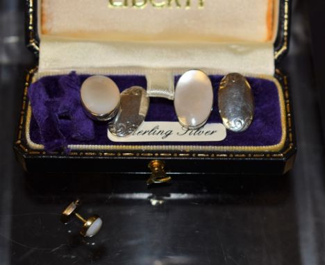 A pair of Liberty silver and mother of pearl oval cufflinks; an opal tie pin (2) 