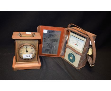 An Ohmmeter; a brass cases mantle clock (2)