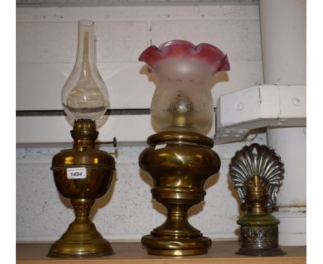 Lighting - a Victorian brass oil lamp, frosted white and cranberry glass shade; others (3) 