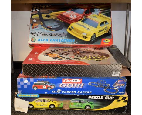 Scalextrix - a Beetle cup racing set;  another Micro Scalextric Alfa Challenge;  others Chad valley and Carrera, all boxed (4