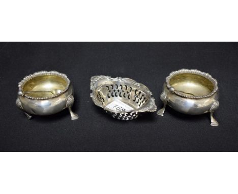 A pair of Victorian silver tripod mustards, shell supports, William Evans, London 1880, with spoons; a sterling silver boat b