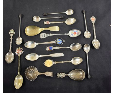 A collection of enamelled spoons; caddy spoons; etc.