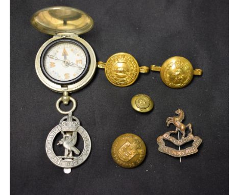 A military compass; Canadian militia badges; Liverpool police badge; etc.