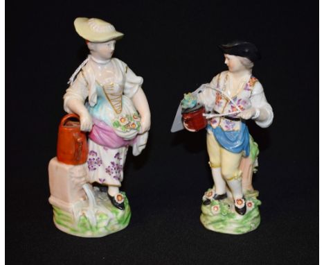 A Derby Patch Mark figure, Gardener's Companion, she stands wearing a yellow bonnet and gathering flowers in her apron, her r