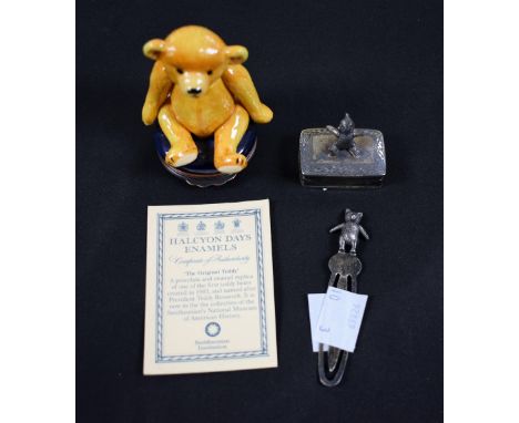 A Halcyon Days enamel pill box in the form of a teddy bear, a depiction of one of the first bears held in the Smithsonian col