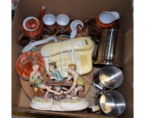 A dial up push button telephone in cream; an inlaid box of playing cards; three commemorative mugs; a solid wood circular cho