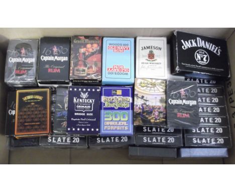 Playing cards, a quantity of modern playing card packs, many unopened, mostly with alcohol advertising including Slate 20 (Bo