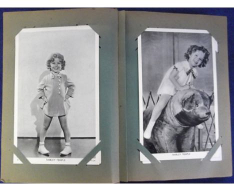 Postcards, Film, Shirley Temple, a vintage album containing approx. 65 cards, mostly from the 1930's Fox Film series (gen gd)